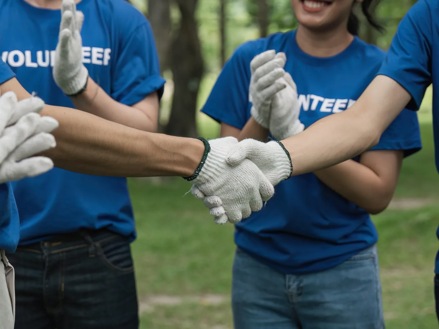 Volunteers working together outdoors in a park